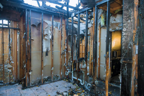 Professional Fire Damage Restoration technician working in Charlevoix, MI